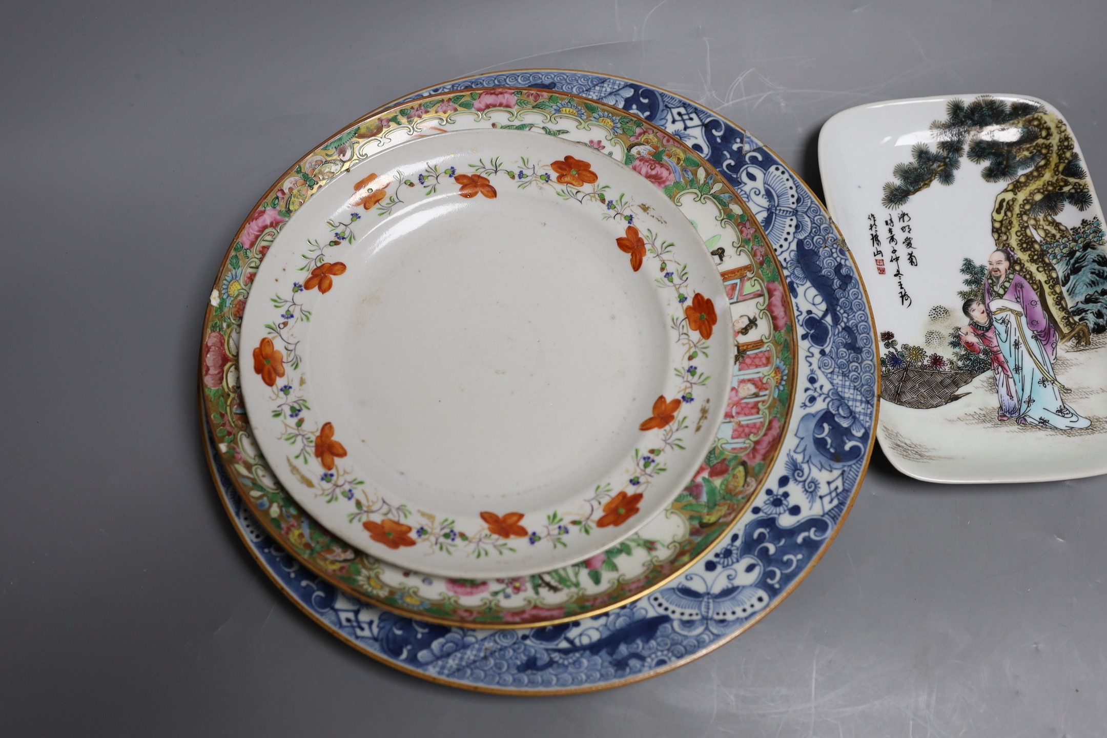 Four 18th / 19th century Chinese plates, and a later dish, largest plate 29cms diameter